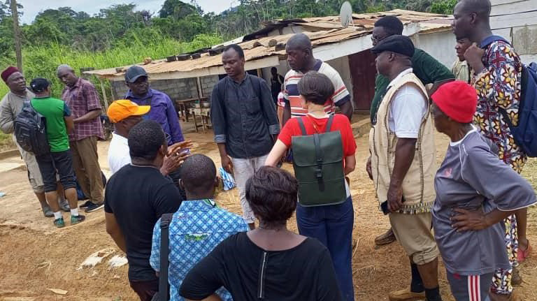 Group of people talking outside